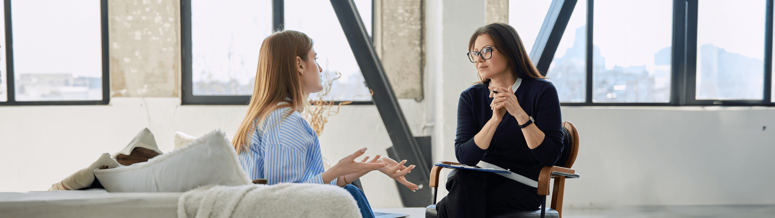 women and doctor discussing treatment